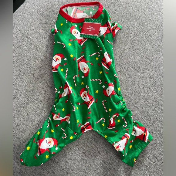 Other - New with tags dog pajamas with Santa print‎